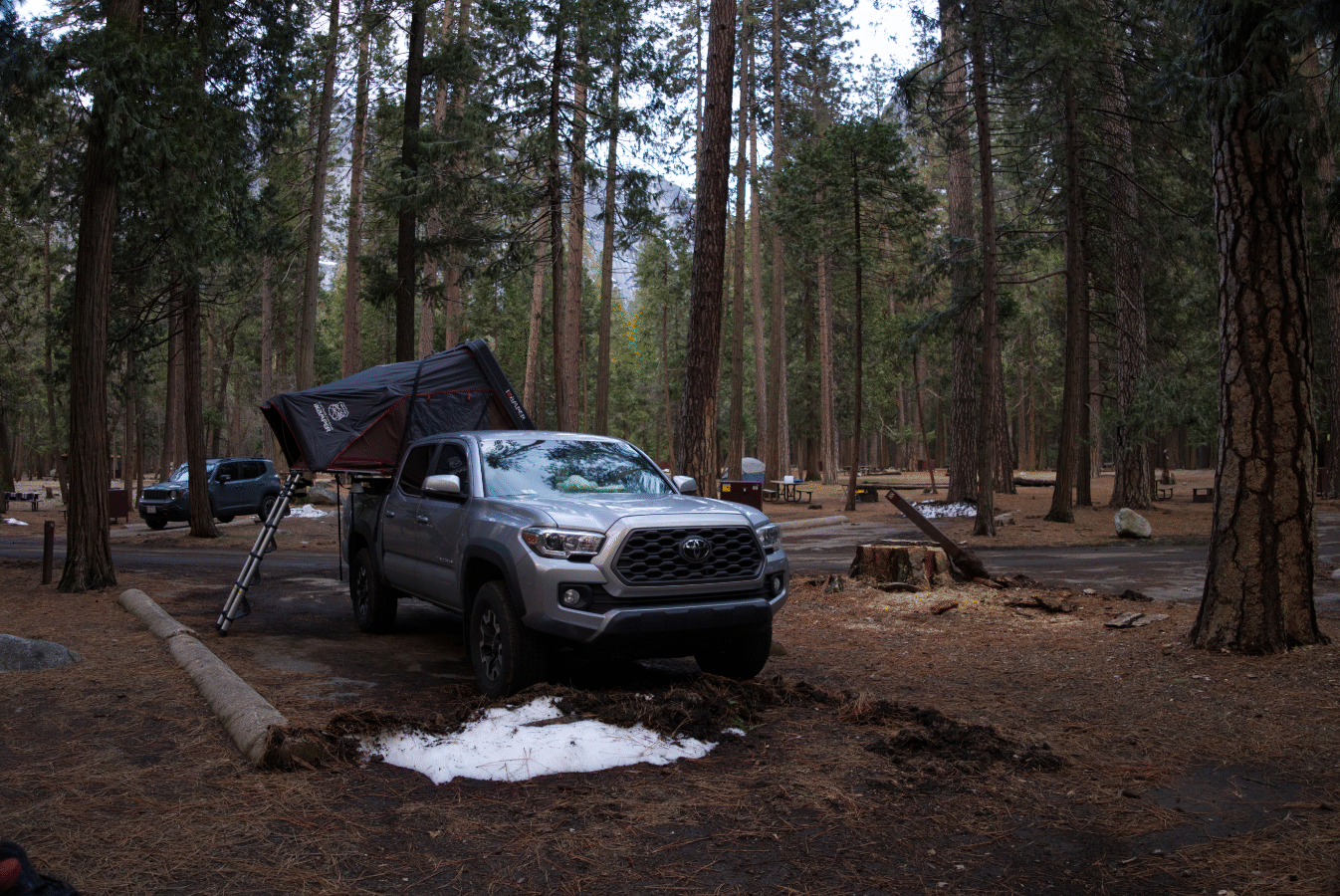 iKamper Skycamp Mini on a 5-foot bed Toyota Tacoma in a forest campground - via NVilloria.com 