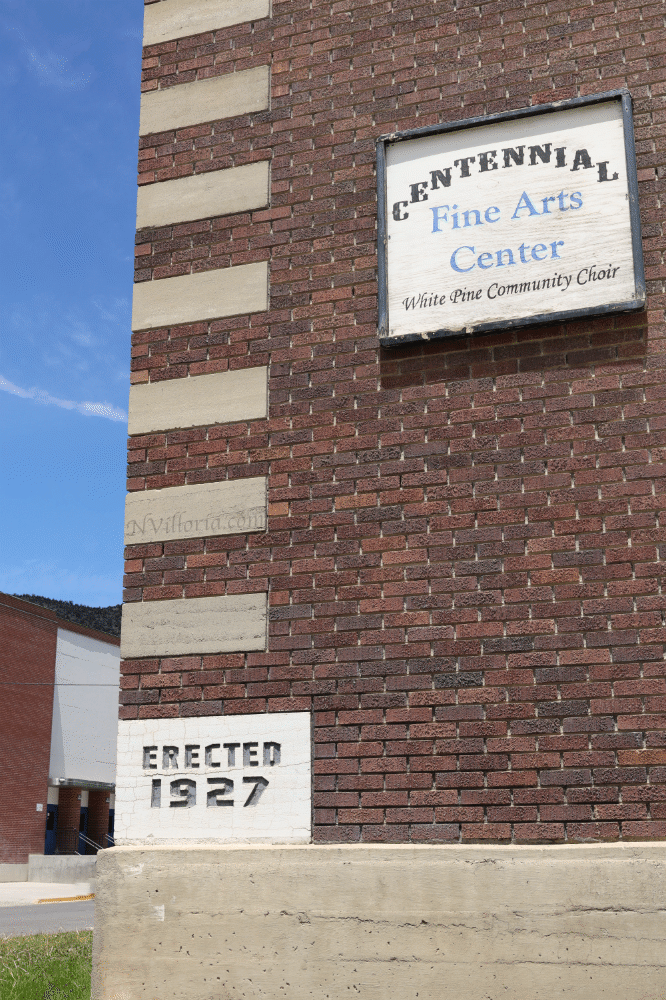 Views from the sidewalk of the exterior of a brick building in Ely, Nevada - via NVilloria.com
