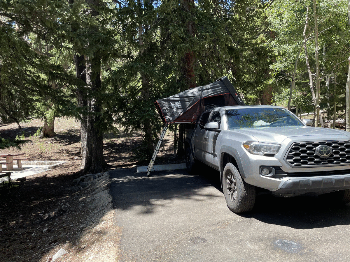 iKamper Skycamp Mini on a 5-foot bed Toyota Tacoma in a forest campground - via NVilloria.com 