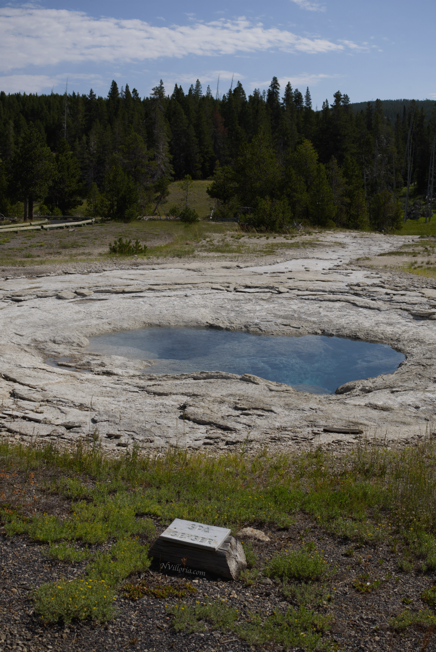 a colorful geyser pool at Yellowstone National Park - via NVilloria.com