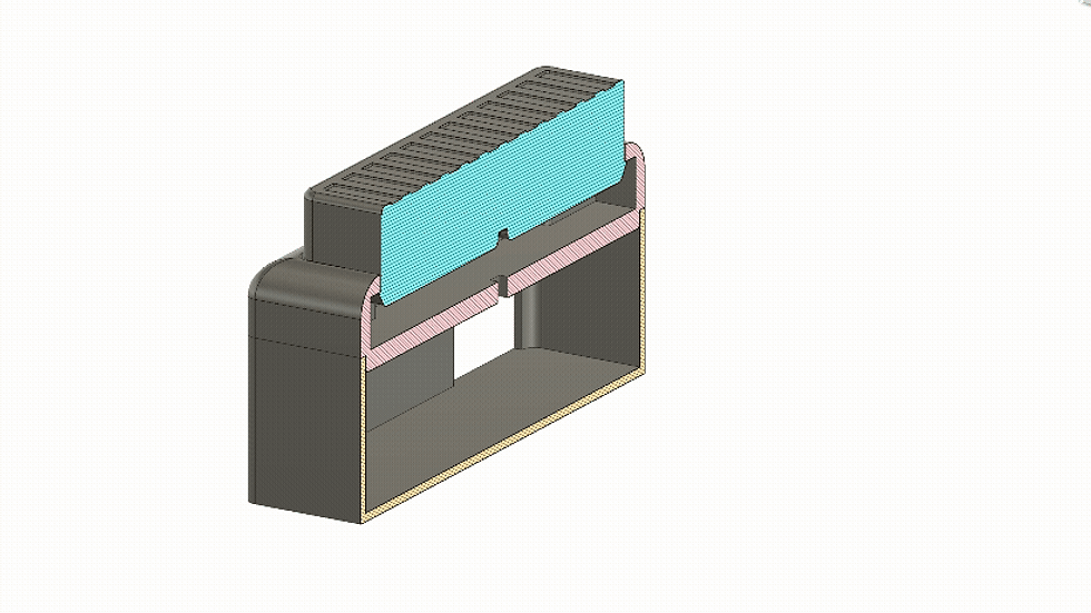 3D model of a rectangular structure with a blue top, pink middle, and beige base. It features intricate interior details, no text visible.