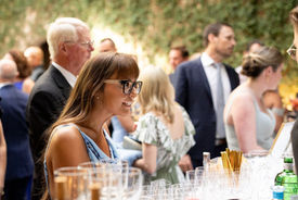 “Corporate event with guests interacting while DJ Dan Fudim delivers professional DJ services in NYC, CT, and Hudson Valley.”