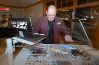 “DJ Dan Fudim performing at an event with professional DJ equipment — NY wedding DJ offering DJ services NYC, CT wedding DJ, and Hudson Valley Wedding DJ services.”