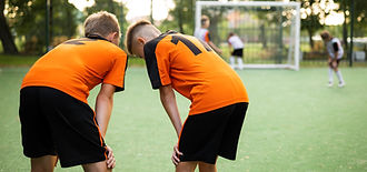 football-trainer-teaching-his-pupils (1).jpg