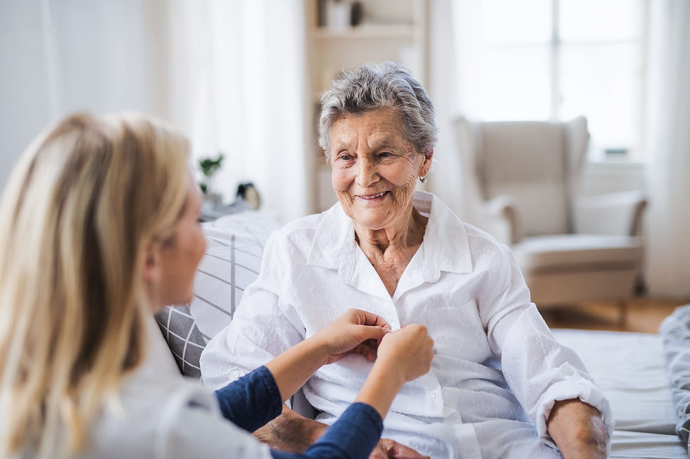 caregiver-help-with-dressing-scaled.jpg