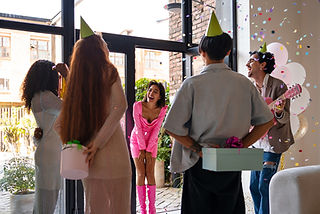 friends-celebrating-birthday-indoors.jpg