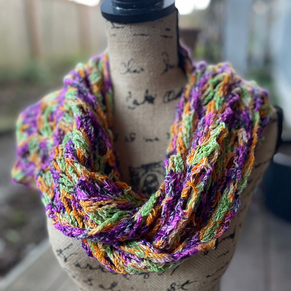 Crocheted Halloween shawl, purple, orange, green