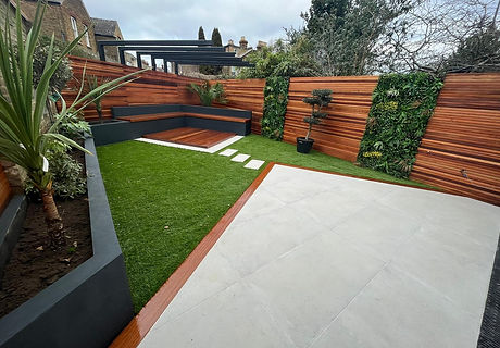 Porcelain patio with cedar trellice and balou decking