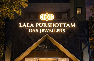 High-end commercial façade with premium illuminated signage