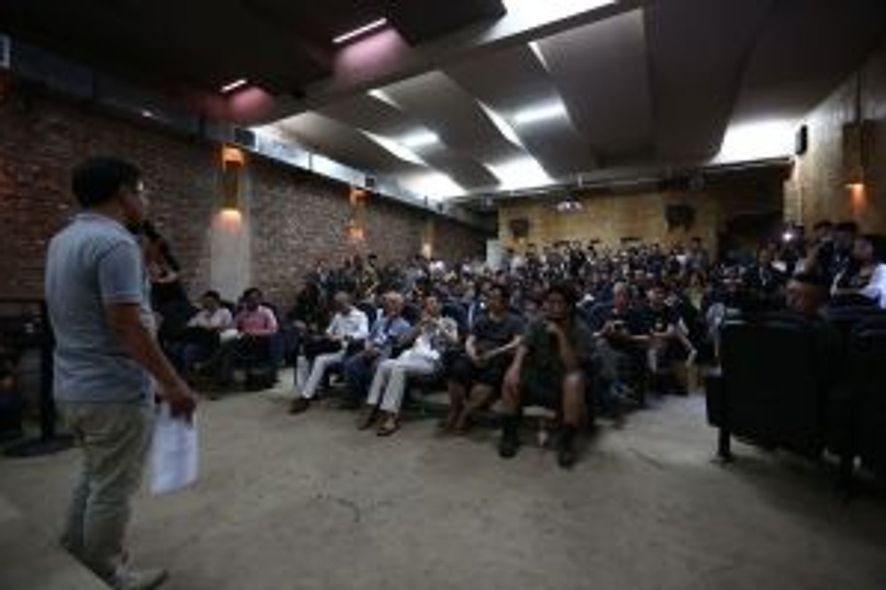 BIFF Artistic Director Wang Hongwei addresses audience in the newly built screening room of the Li Xianting Film Fund. (Photo courtesy BIFF)