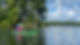 Canoe on calm, clear waters of Little Clear Pond, quiet Adirondack paddle NY