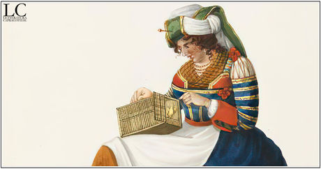 Cosa tiene in mano la donna in costume di Capracotta?