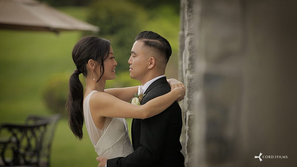bride and groom embrace outside on the wedding day