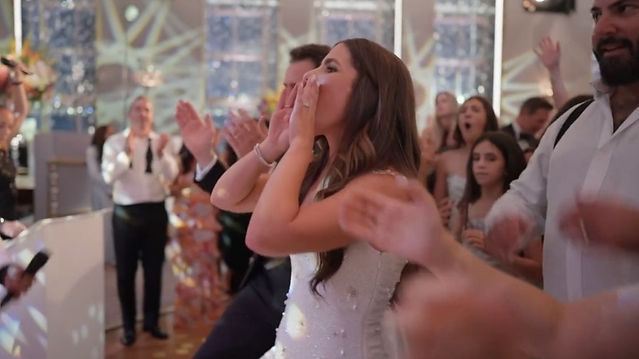 bride having fun on the reception dance floor