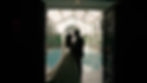 bride and groom embrace inside venue conservatory
