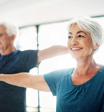 Elderly Couple Practising Yoga