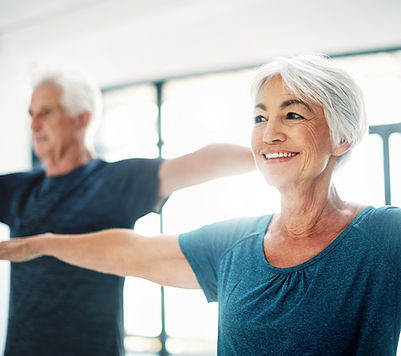 Elderly Couple Practising Yoga
