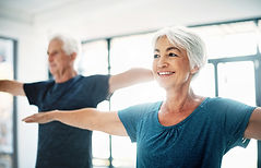 Elderly Couple Practising Yoga