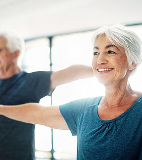 Seniors enjoying a Yoga Class prescribed by their Social Prescriber