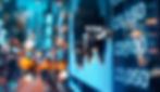 Display of Stock market quotes with city scene reflect on glass.jpg