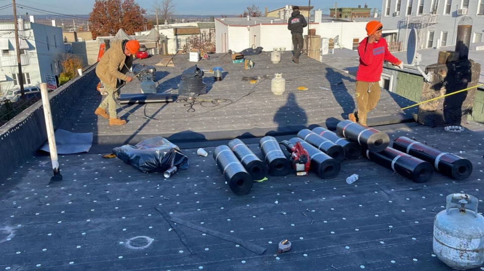 Firestone roof rolls on a flat roof. Union city roofing
