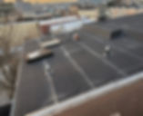 Jersey City local business with a flat roof undergoing professional installation