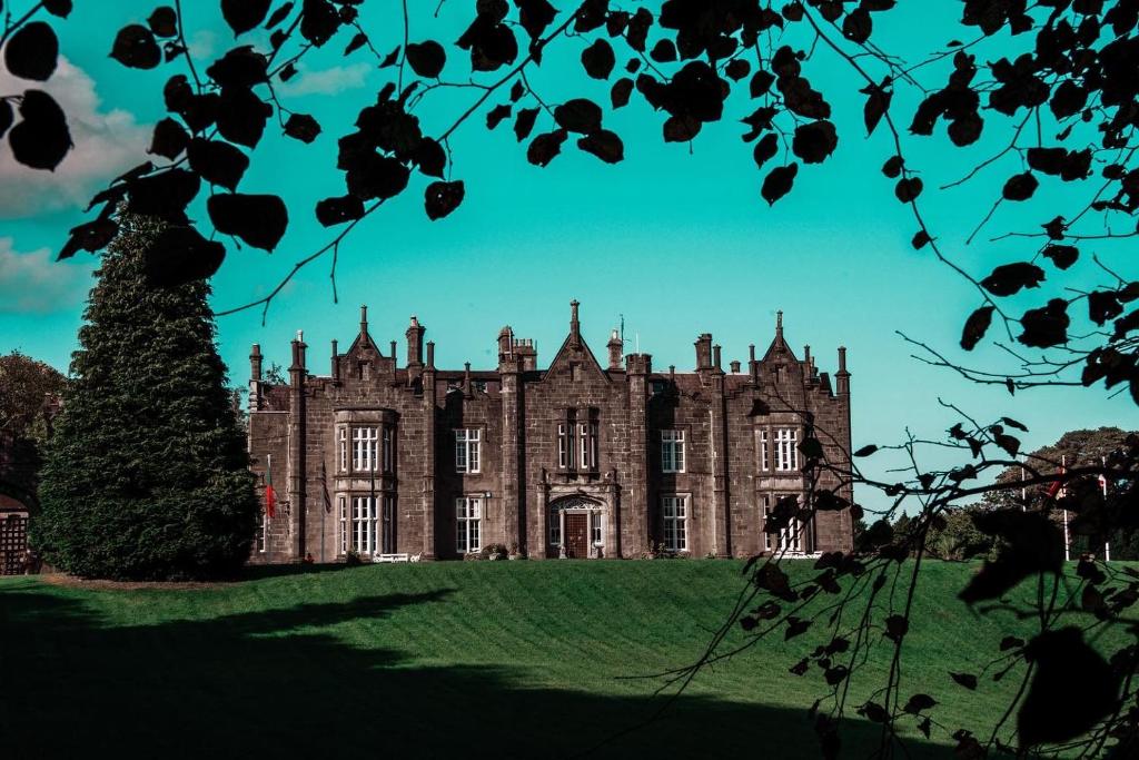 Belleek Castle at dusk - it is on the destination guide to Mayo