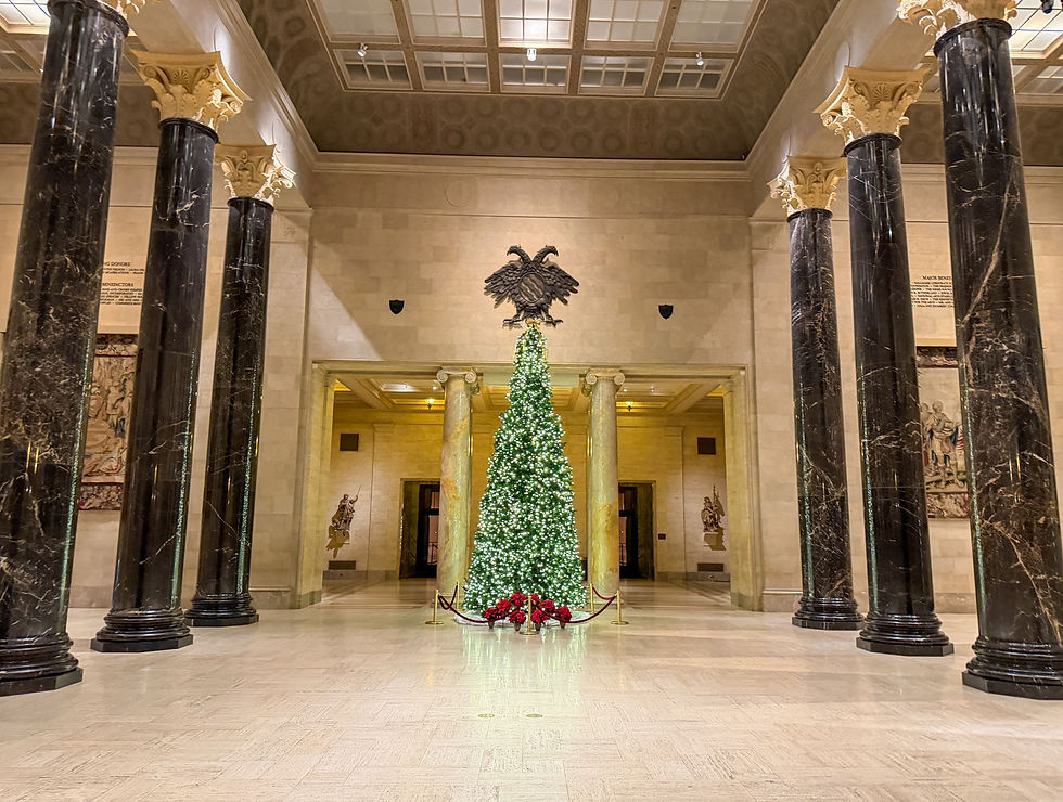 A decorated Christmas tree glows in the grand foyer of the Nelson-Atkins Museum of Art in Kansas City, Mo., on Friday, Nov. 28, 2025. ©2025 Rubyanne Moley/SMU