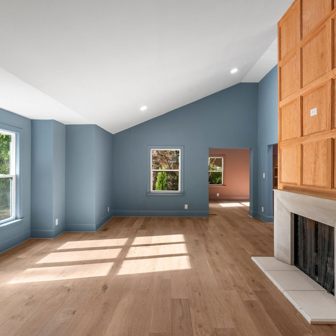 Cotswold Exterior facade renovated with new covered entry and cohesive finishes by KEEN Building Co. CLT