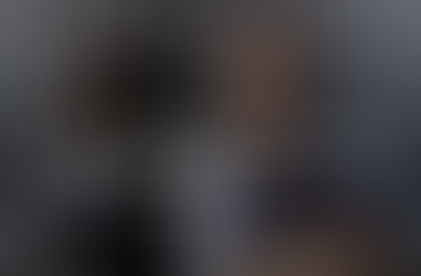 manager employee conversation office desk