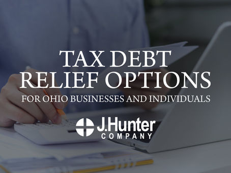 Ohio tax attorney reviewing IRS tax debt relief options with a client