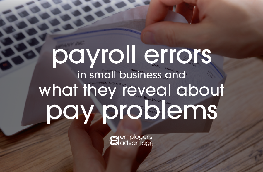 person checking their payroll check for errors