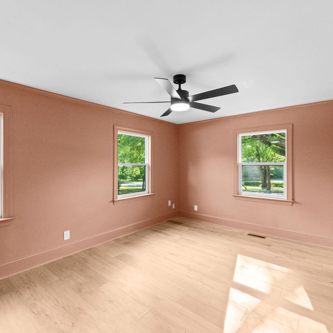 Cotswold Exterior facade renovated with new covered entry and cohesive finishes by KEEN Building Co. CLT