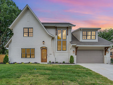 Cotswold Charlotte custom home exterior with screened porch