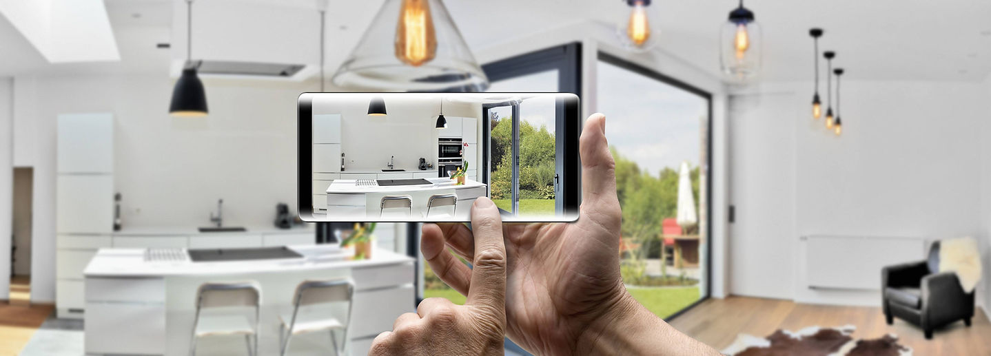 2 hands holding iphone in kitchen (2).j