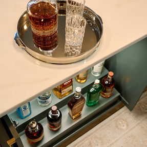 Custom cabinets, custom shelving, floating shelves, custom bar, LED lighting, Pizza Kitchen, design build, subway tile, hand built, liquor cabinet, glass doors