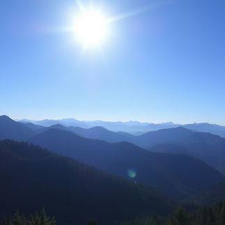 a sunny day with blue sky and mountains in the background.jpg