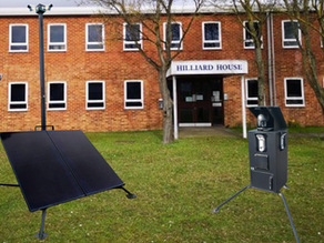 SKYGUARD security equipment outside an office building.