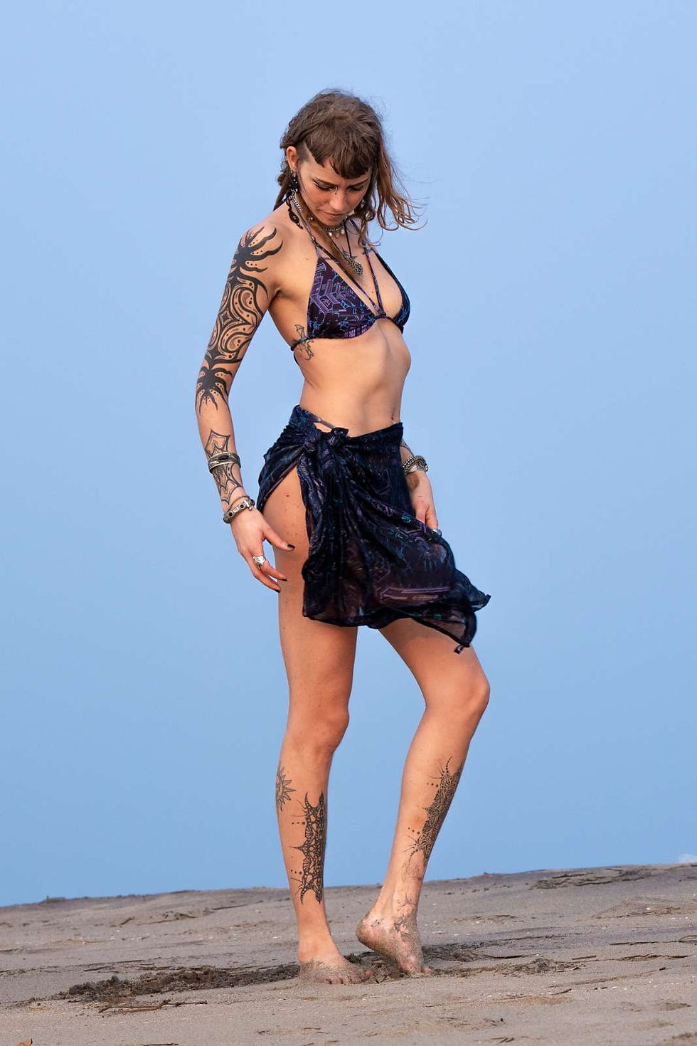 Close up view of the art wear bikini set along with scarf wrapped at bottom