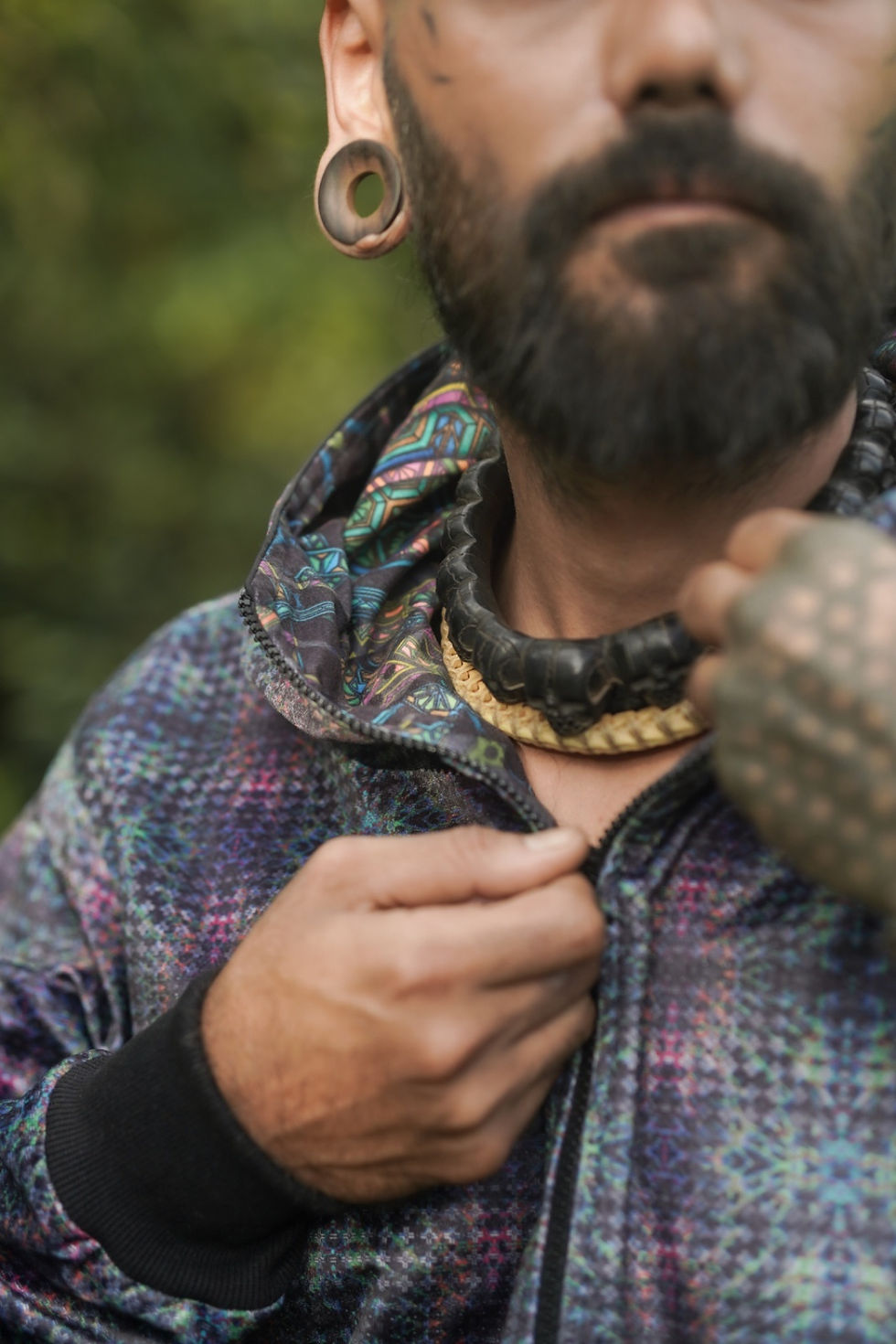 Thumbnail: Close up view of art on the reverse side of jacket