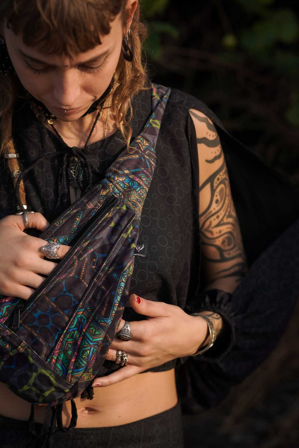 Close view of unzipping the Multi purpose sling bag