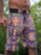 Front view of the trippy psychedelic art wear swim wear shorts