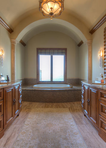 Luxury bathroom with wooden cabinets, mirrors, and large window Home Concrete Struksures CLIENT
