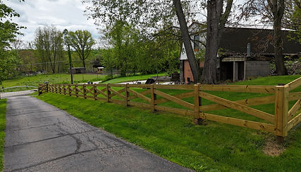 Crossbuck style board fence.