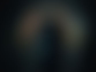 A worker wearing SCBA protection in a confined space