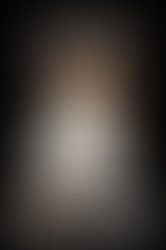Book cover of "The Ghostwriter" by Julie Clark. Text emerges through flames on a black background, creating a mysterious and intense mood.