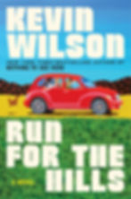Red car with people driving through a grassy landscape, followed by a chicken. Blue sky and hills in background. Text: "Kevin Wilson," "Run For The Hills."