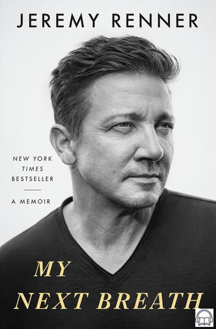 Black and white memoir cover featuring actor Jeremy Renner seriously gazing forward. Text reads: "Jeremy Renner," "New York Times Bestseller," "A Memoir," "My Next Breath."