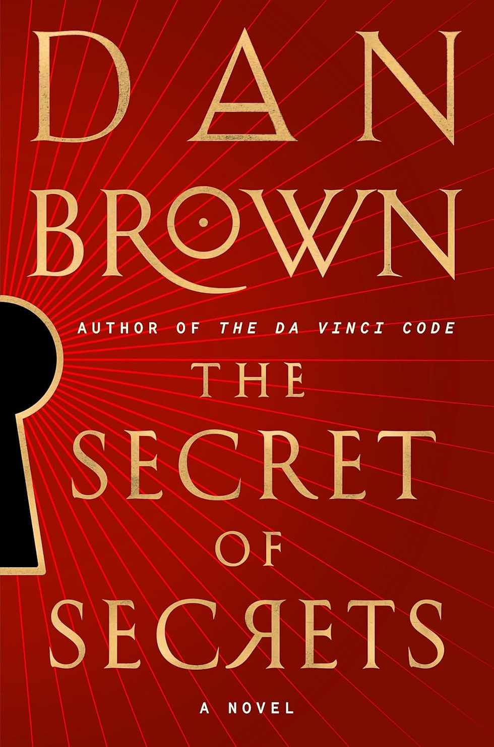 Red book cover with a keyhole silhouette. Text: "Dan Brown, Author of The Da Vinci Code, The Secret of Secrets, A Novel." Golden lettering. Radiating lines.