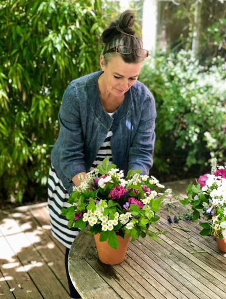 Francesca adds statement flowers to a bouquet